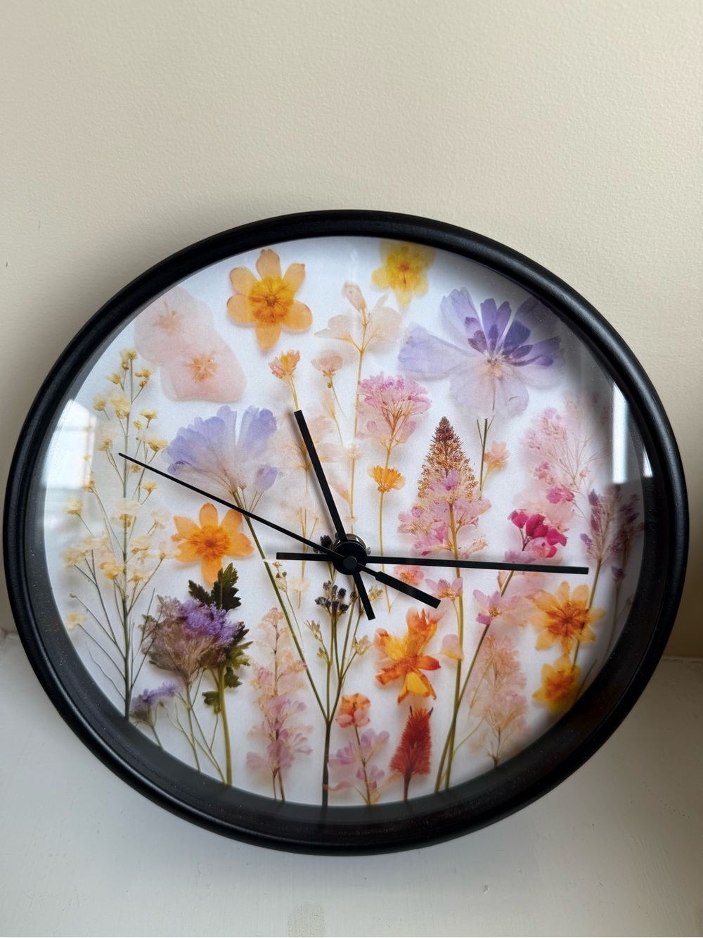 Pressed Floral Wall Clock in Black with Pastel Blooms